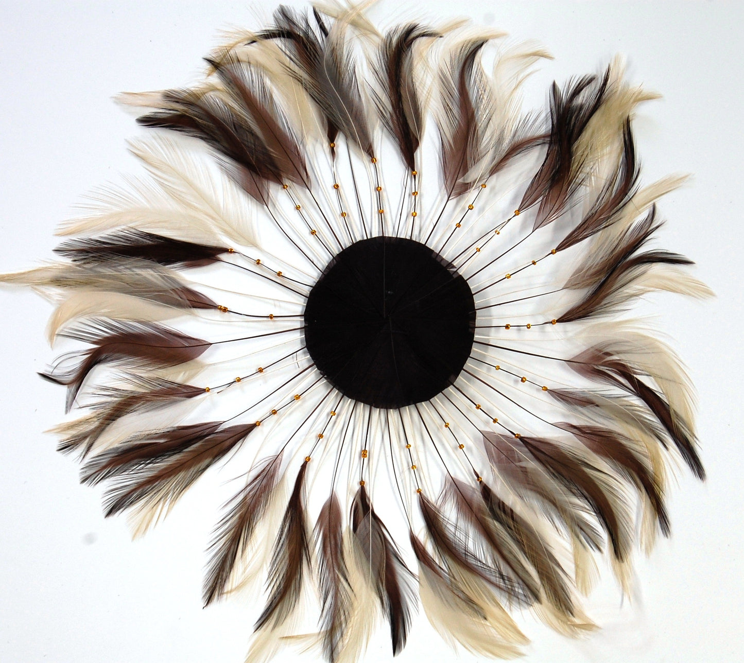 A brown beige feather pinwheel