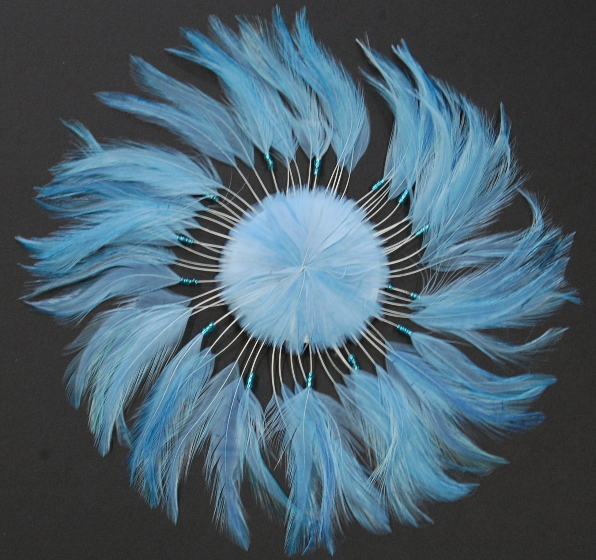 A sky blue pin wheel