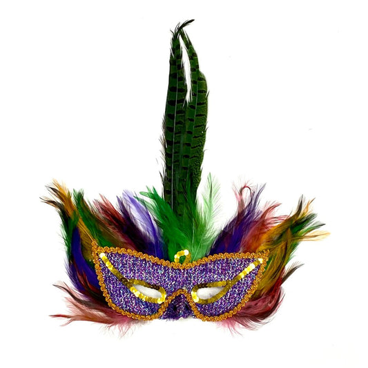 A purple and gold mask with green feathers. 