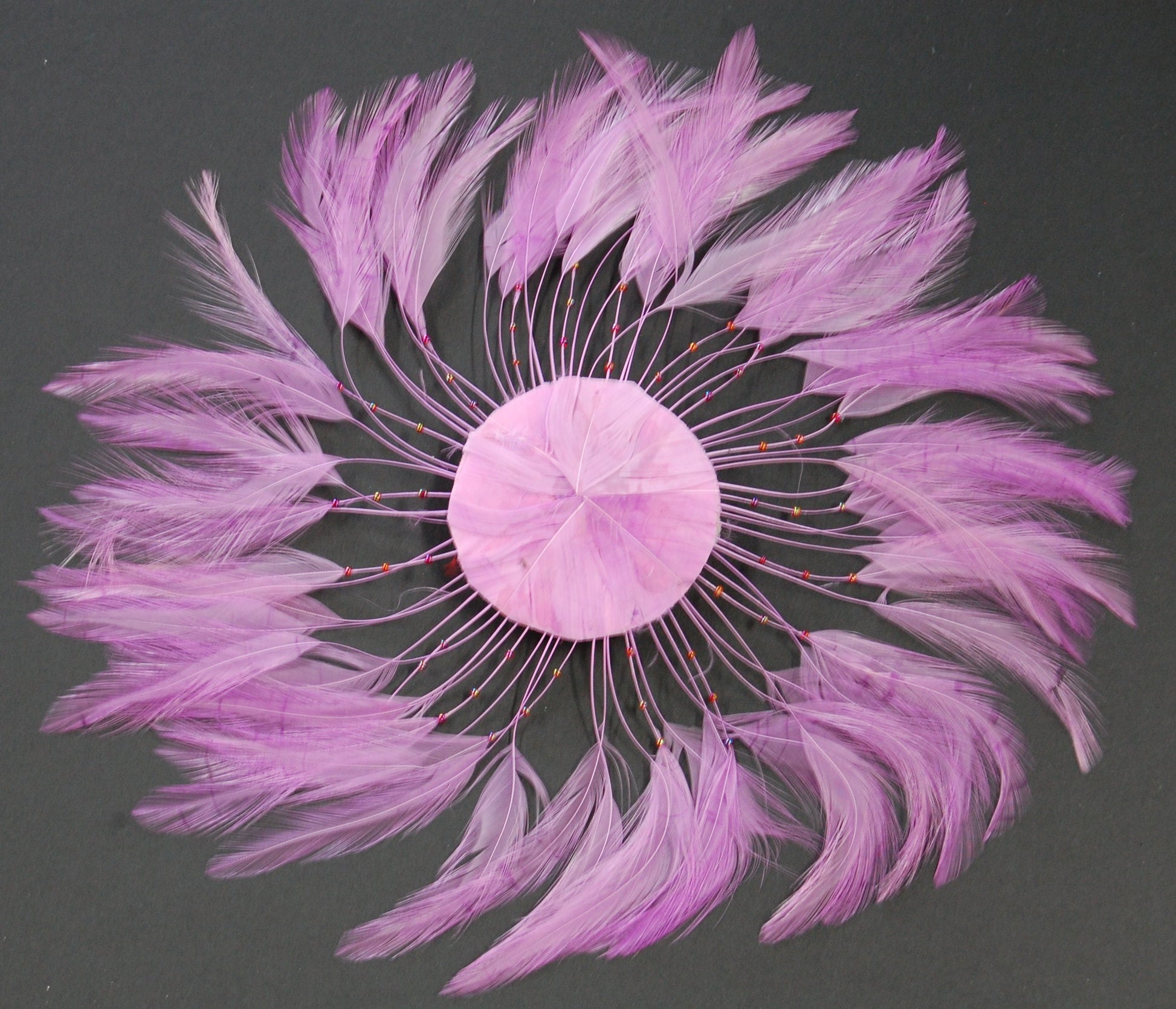 a lilac colored feather pinwheel